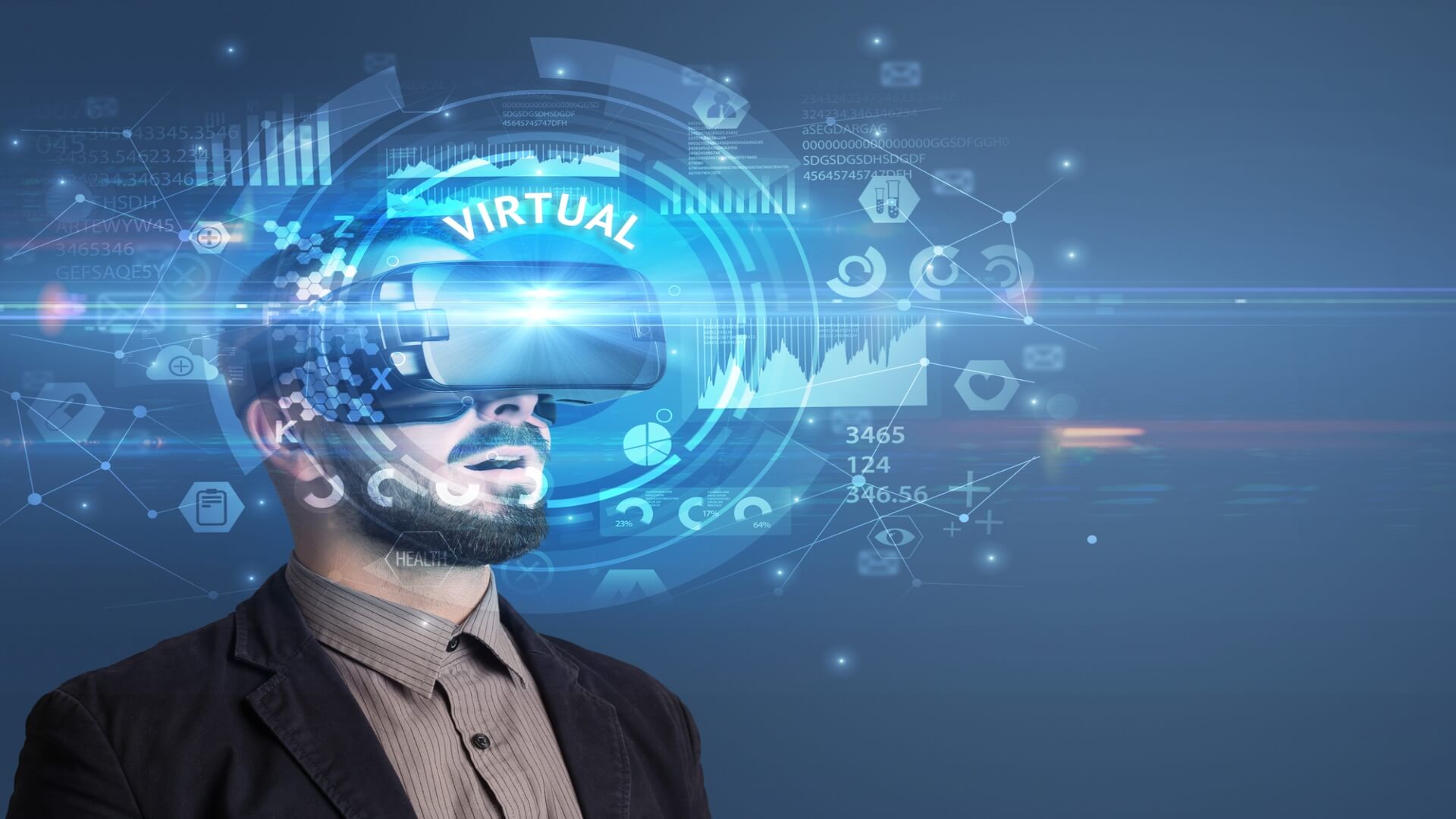 Bearded man using a virtual reality.headset.