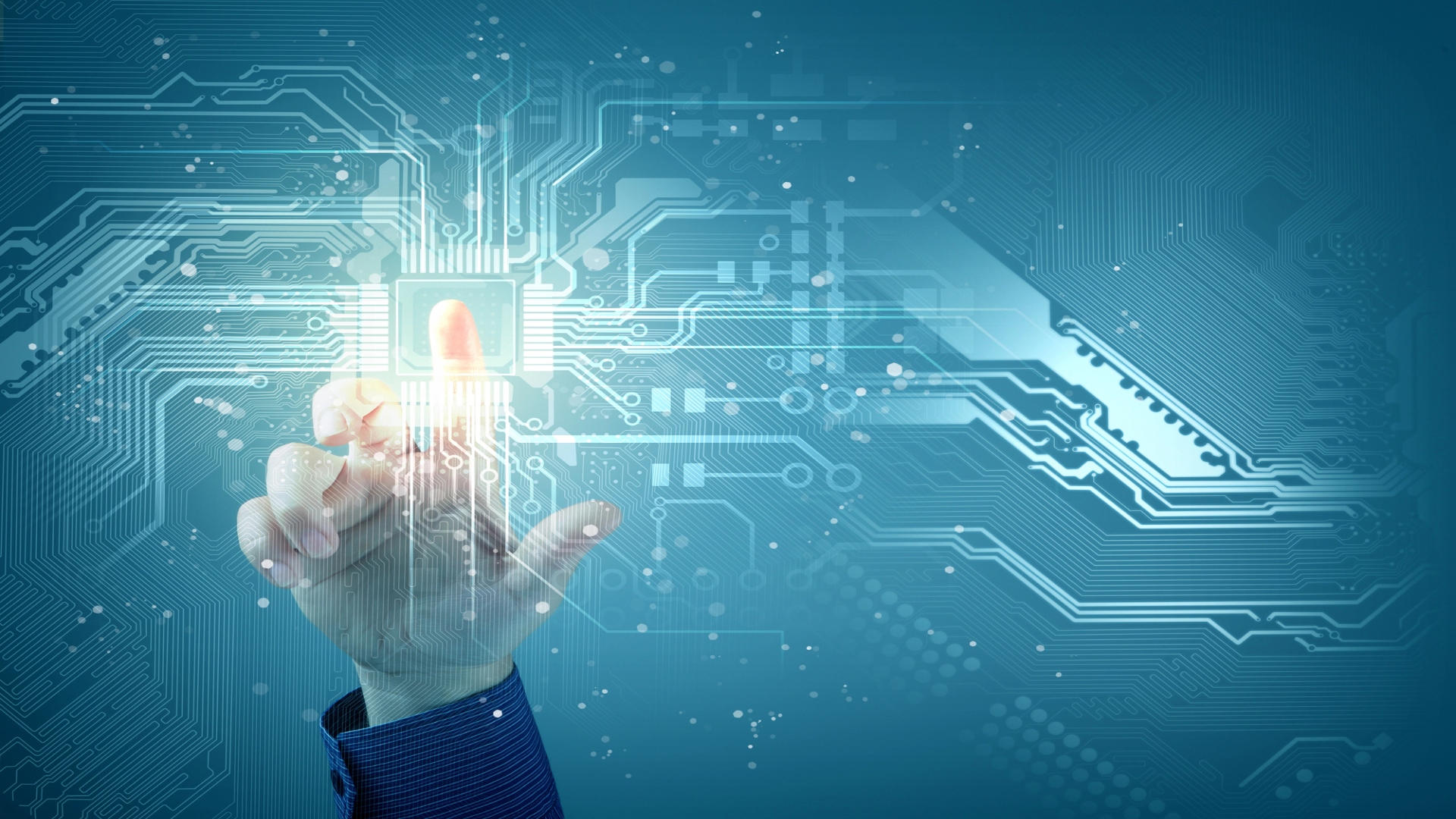 A finger pointing at a blue high tech image